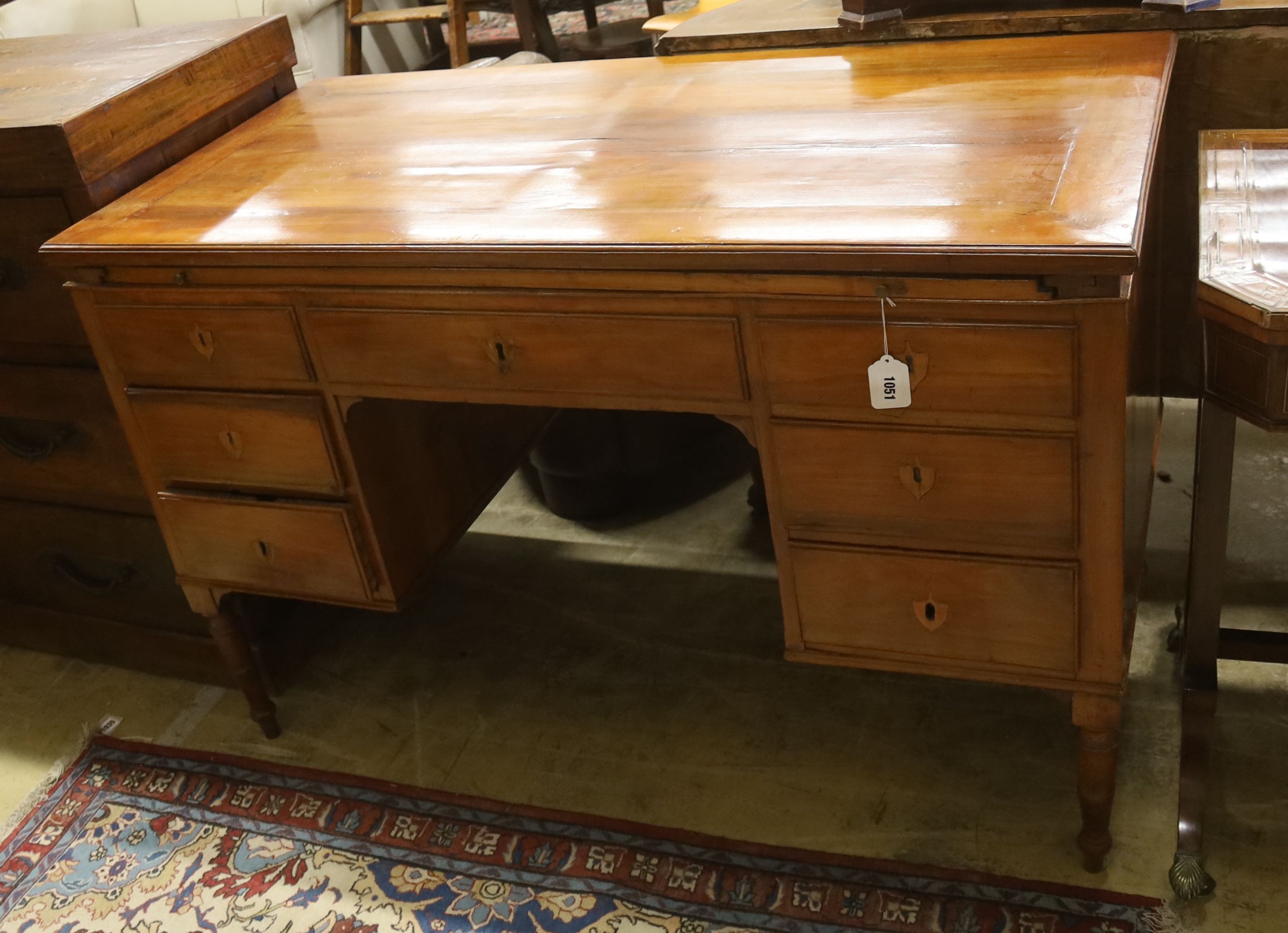 A late 19th/ early 20th century Italian walnut kneehole desk, width 122cm, depth 60cm, height 79cm